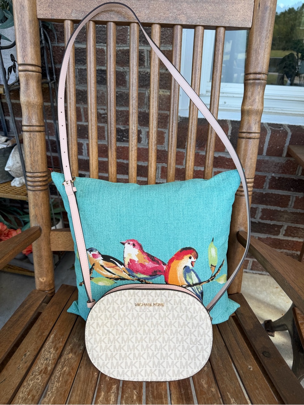 Authentic Michael Kors oval Jet Set Crossbody bag in pink and white logo